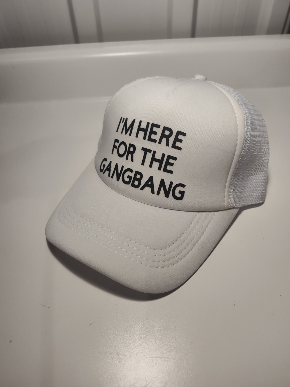 White Trucker Cap with Bold Black Text - I'm Here For The Gangbang